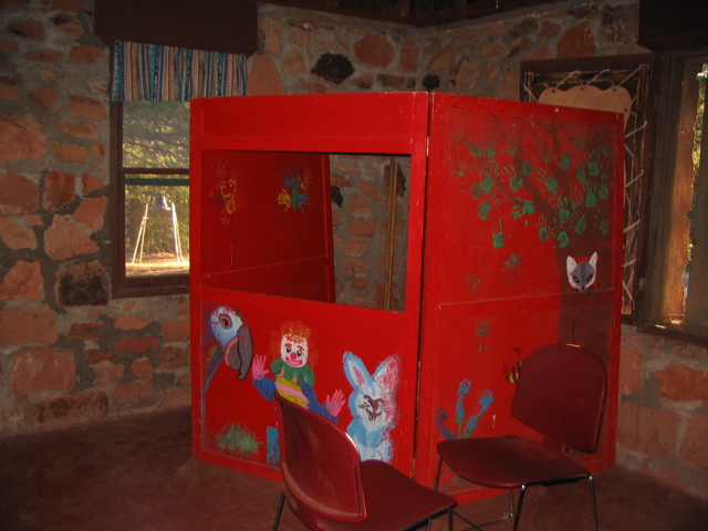 We should have put her in the puppet booth!