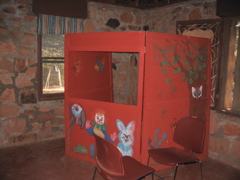 We should have put her in the puppet booth!